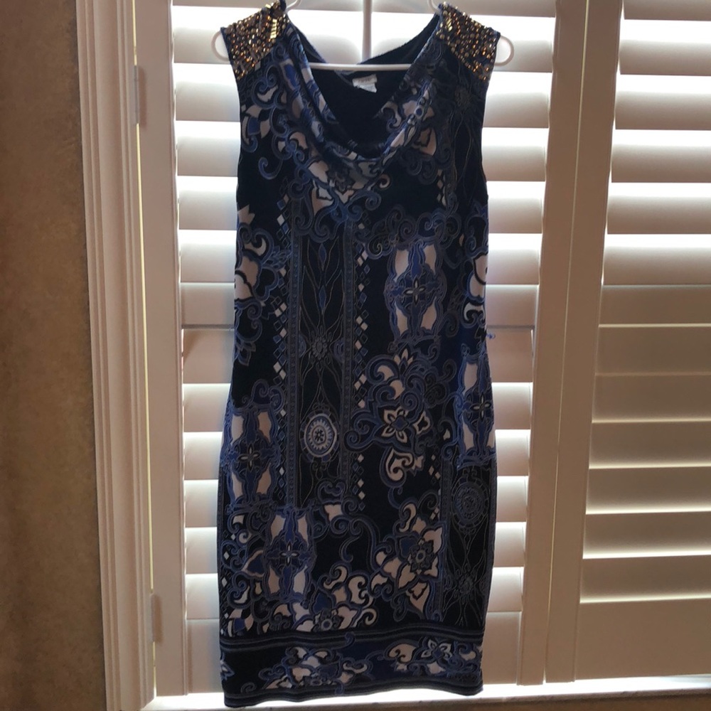 Cache - blue black with gold accents.